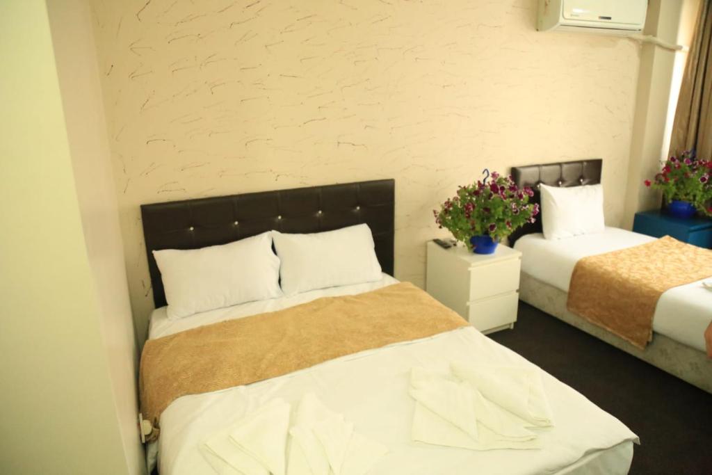 Postel nebo postele na pokoji v ubytování holiday family apart
