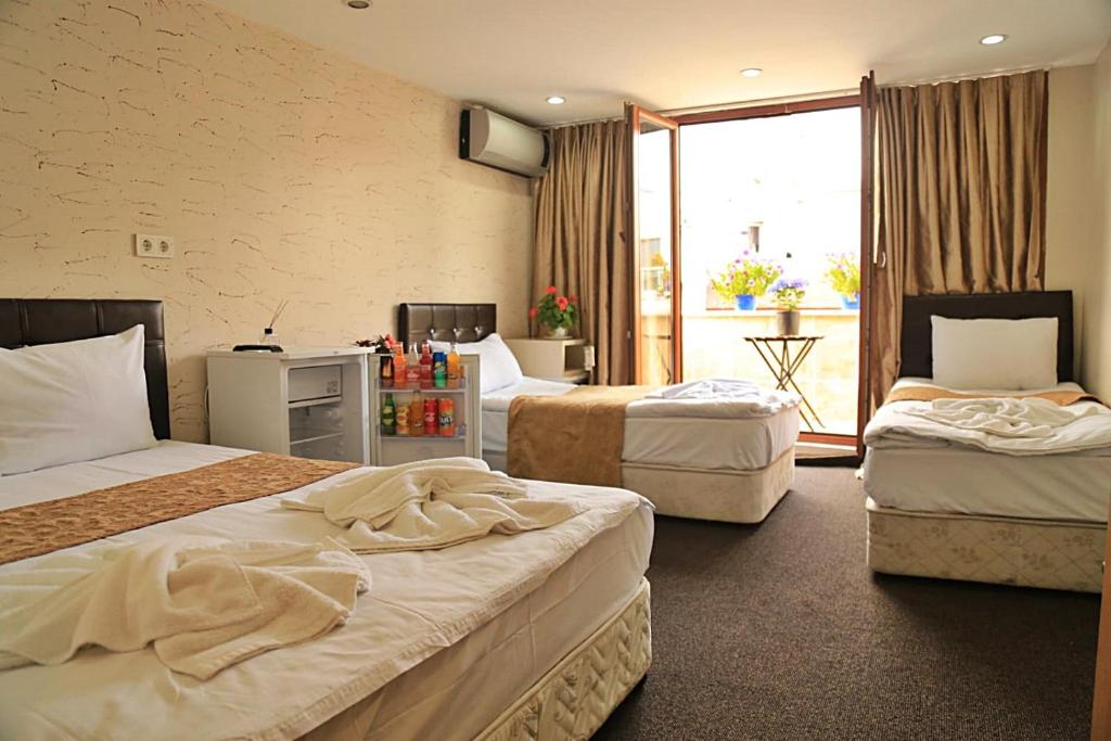 Postel nebo postele na pokoji v ubytování holiday family apart
