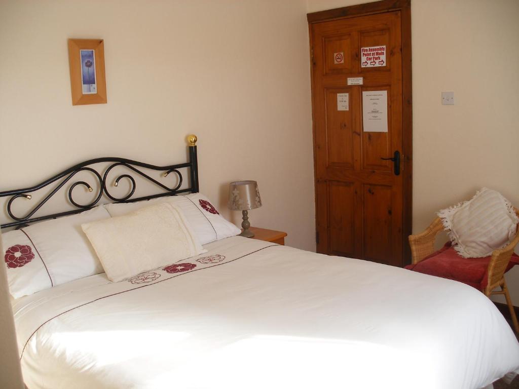 Postel nebo postele na pokoji v ubytování Doolin Cottage Accommodation
