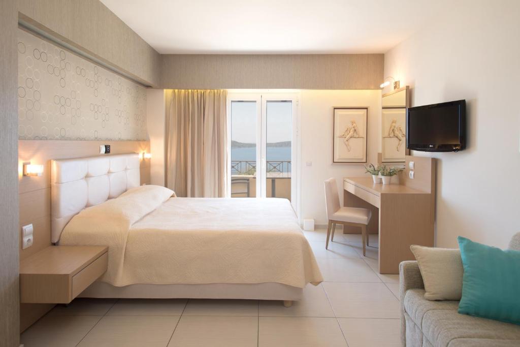 Postel nebo postele na pokoji v ubytování Hotel Philip