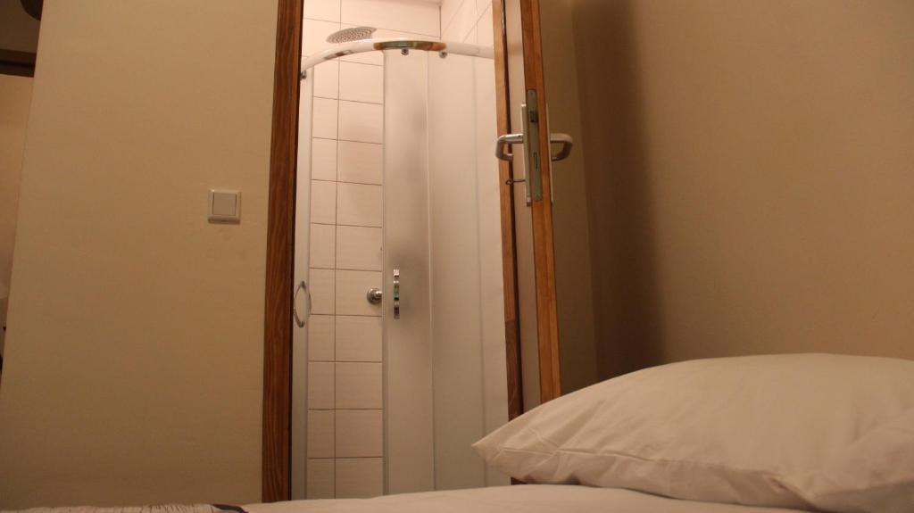 Postel nebo postele na pokoji v ubytování ELG Rooms