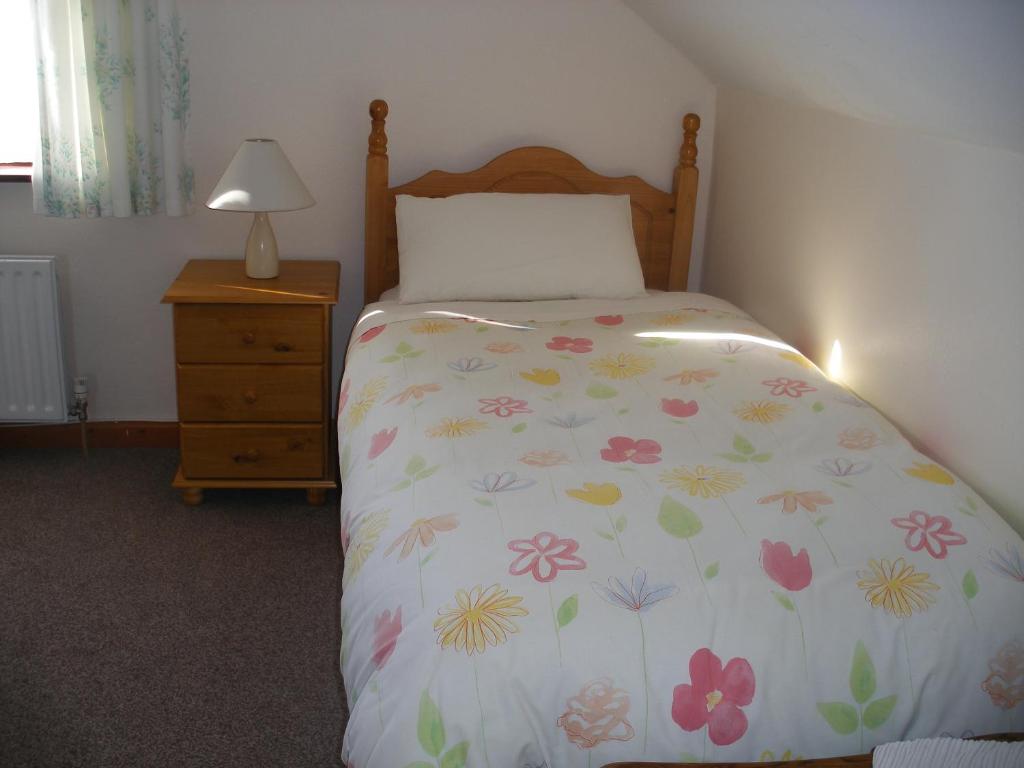 Postel nebo postele na pokoji v ubytování Doolin Cottage Accommodation