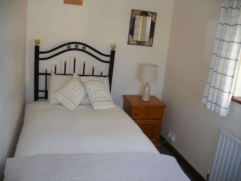 Postel nebo postele na pokoji v ubytování Doolin Cottage Accommodation