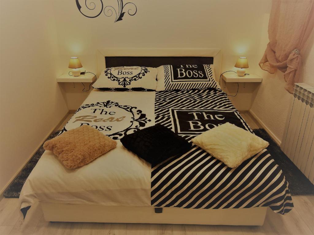 Postel nebo postele na pokoji v ubytování Sweet Dreams Apartment