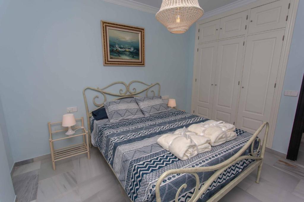 Posteľ alebo postele v izbe v ubytovaní Villa Venecia, Apartamento de Lujo en 1º línea de playa + parking