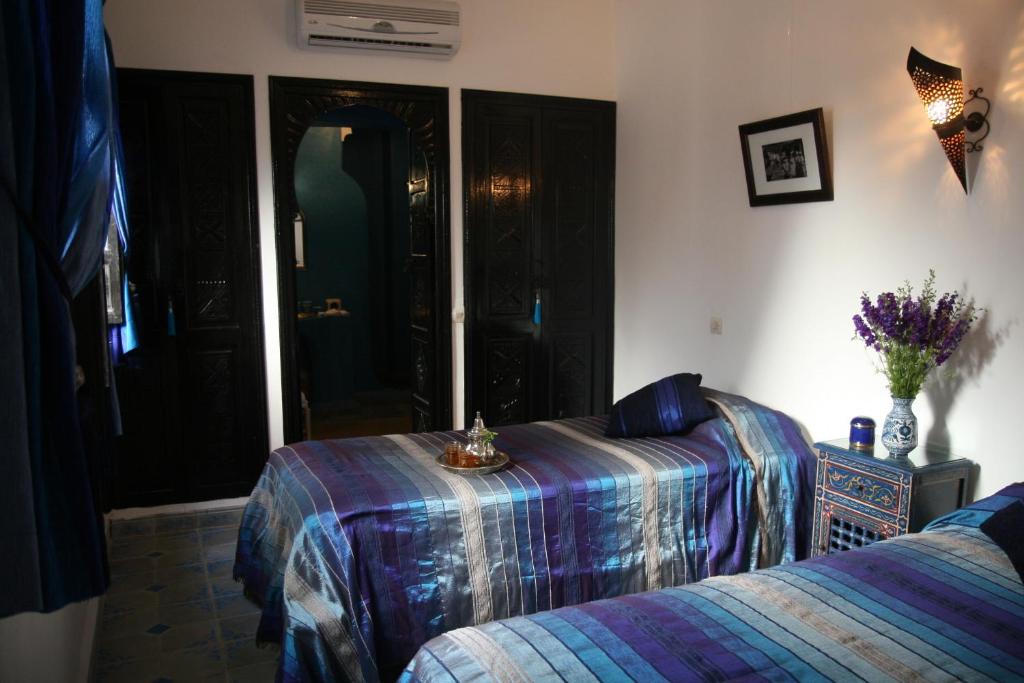 Postel nebo postele na pokoji v ubytování Riad Dar Zampa