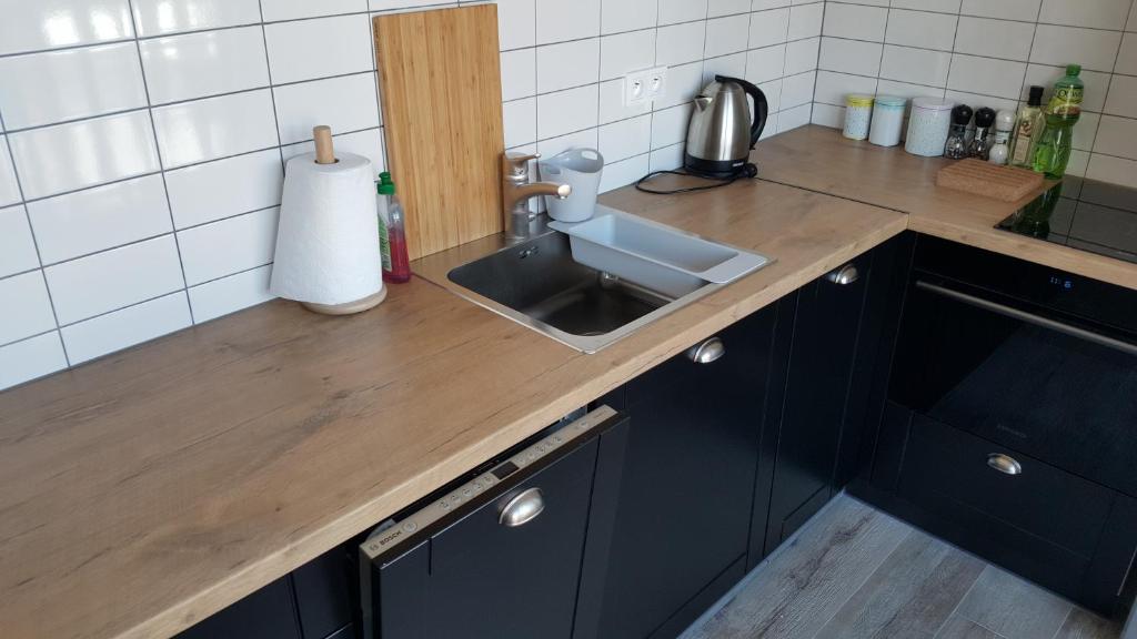 Kuchyňa alebo kuchynka v ubytovaní Apartament Homole A6