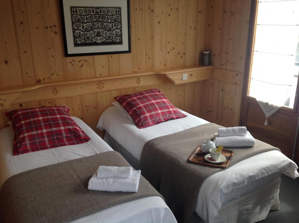 Postel nebo postele na pokoji v ubytování Chalet de Roselend