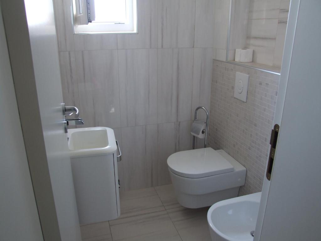 Koupelna v ubytování Apartment Ika