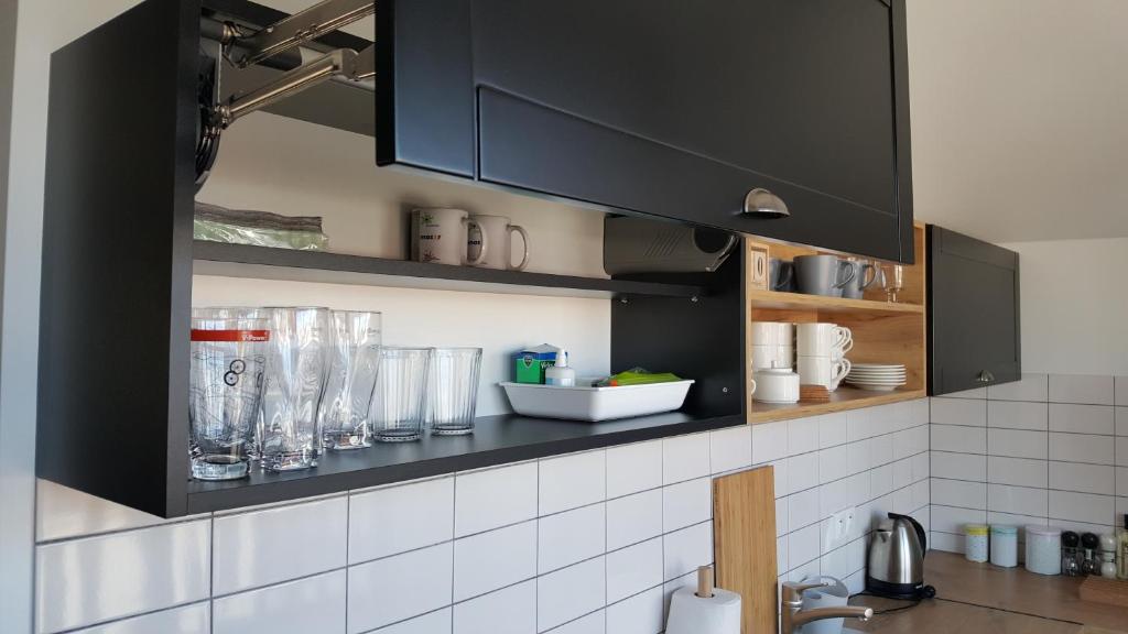 Kuchyňa alebo kuchynka v ubytovaní Apartament Homole A6