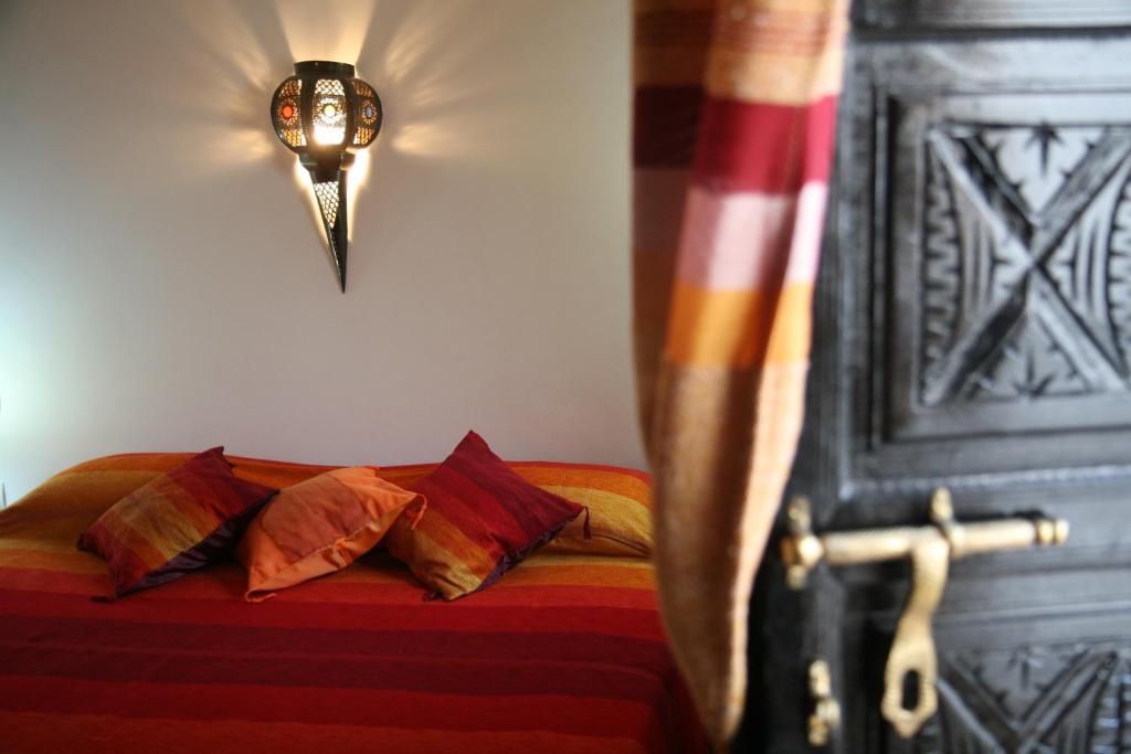 Postel nebo postele na pokoji v ubytování Riad Dar Zampa