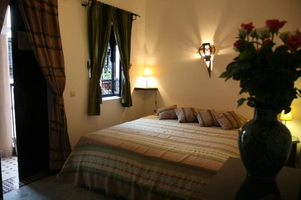 Postel nebo postele na pokoji v ubytování Riad Dar Zampa