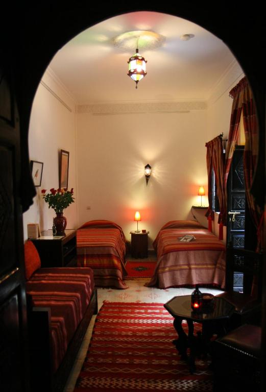 Postel nebo postele na pokoji v ubytování Riad Dar Zampa