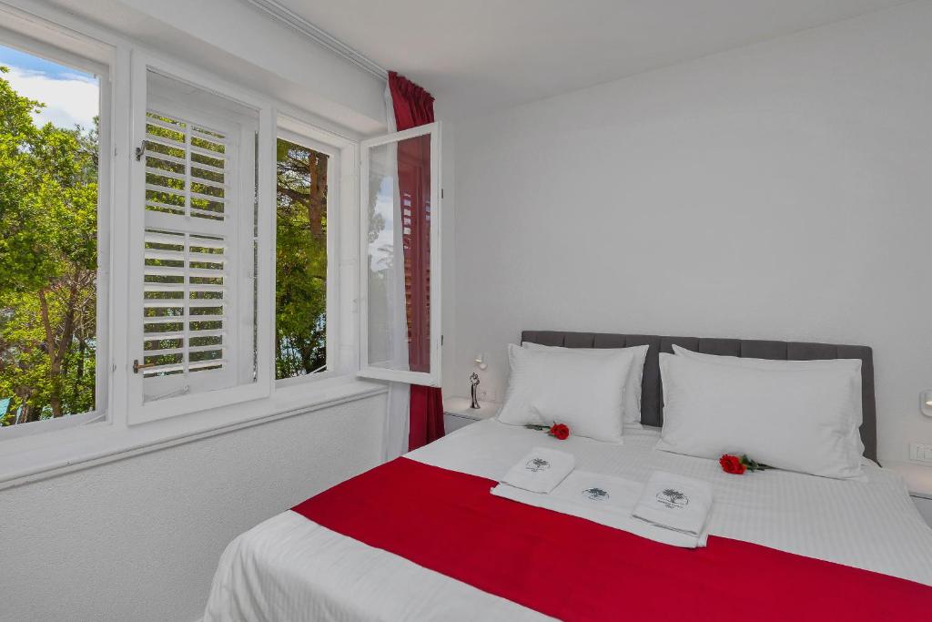 Postel nebo postele na pokoji v ubytování Luxury Rooms Paradise Garden