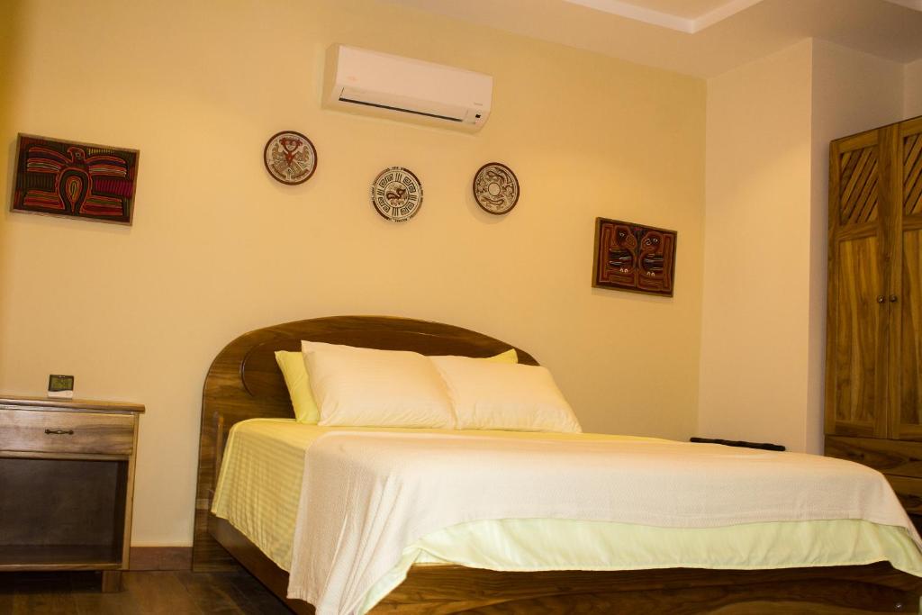 Postel nebo postele na pokoji v ubytování Hotel-Boutique Patampa