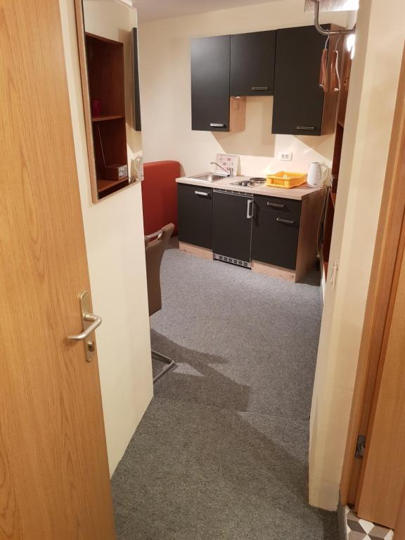 Kuchyň nebo kuchyňský kout v ubytování ELG Rooms