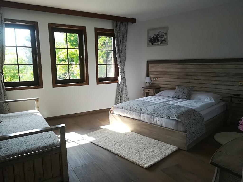 Postel nebo postele na pokoji v ubytování Manoleva House