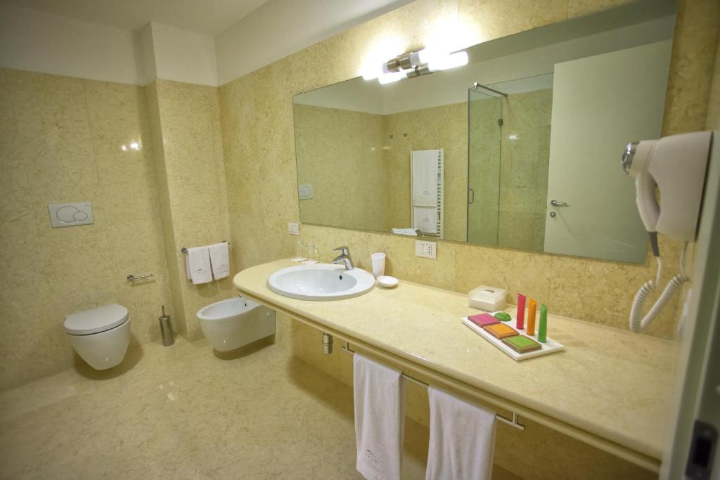 Koupelna v ubytování La Dimora del Baco Hotel