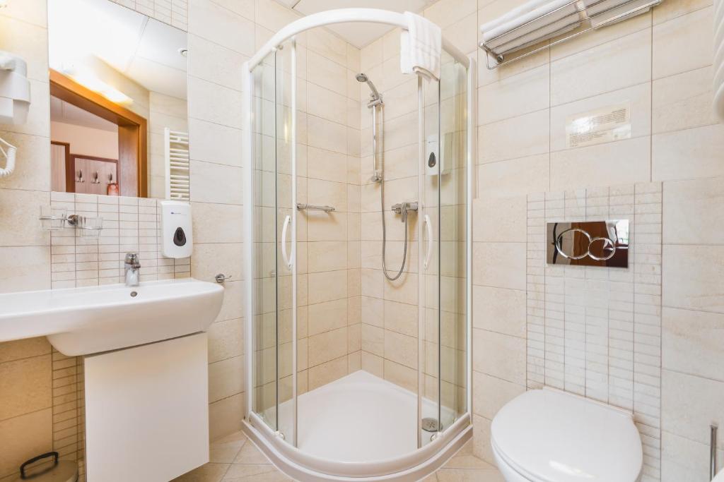 Kúpeľňa v ubytovaní Domus Mater Hotel
