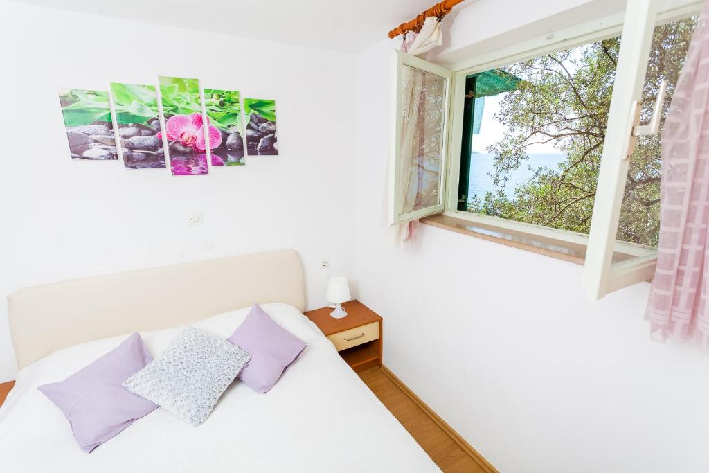 Postel nebo postele na pokoji v ubytování Holiday home Marija