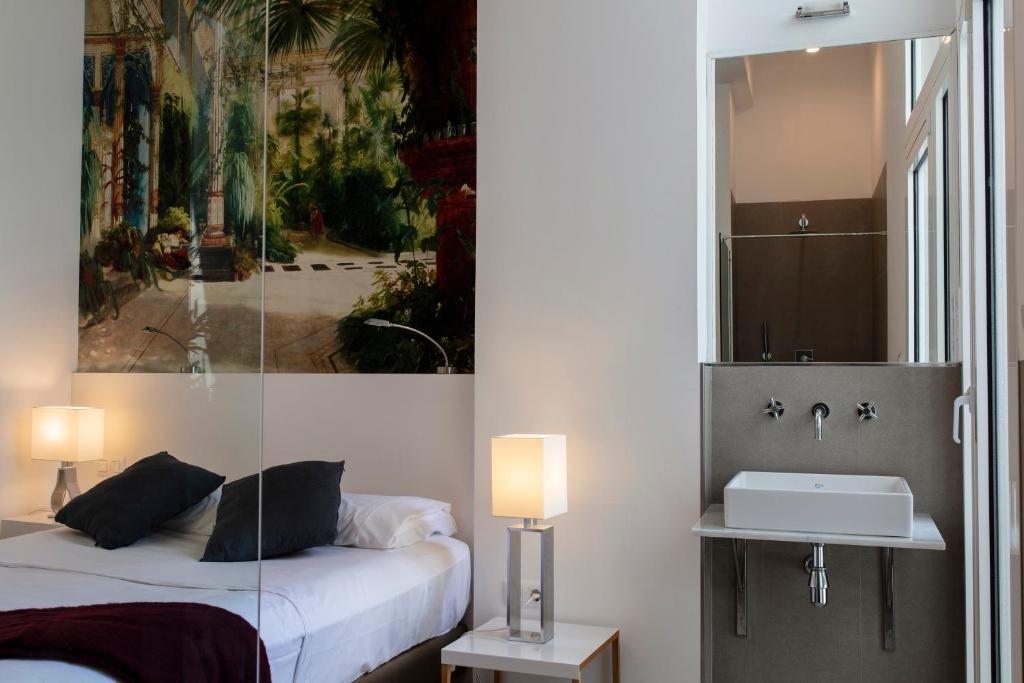 Postel nebo postele na pokoji v ubytování FLORIT FLATS - Serranos Apartment