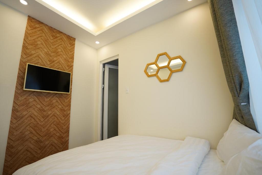 TV a/nebo společenská místnost v ubytování Homeland Hotel