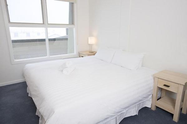 Кровать или кровати в номере White Crystal Apartments