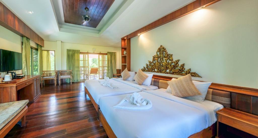 Postel nebo postele na pokoji v ubytování Vana Varin Resort