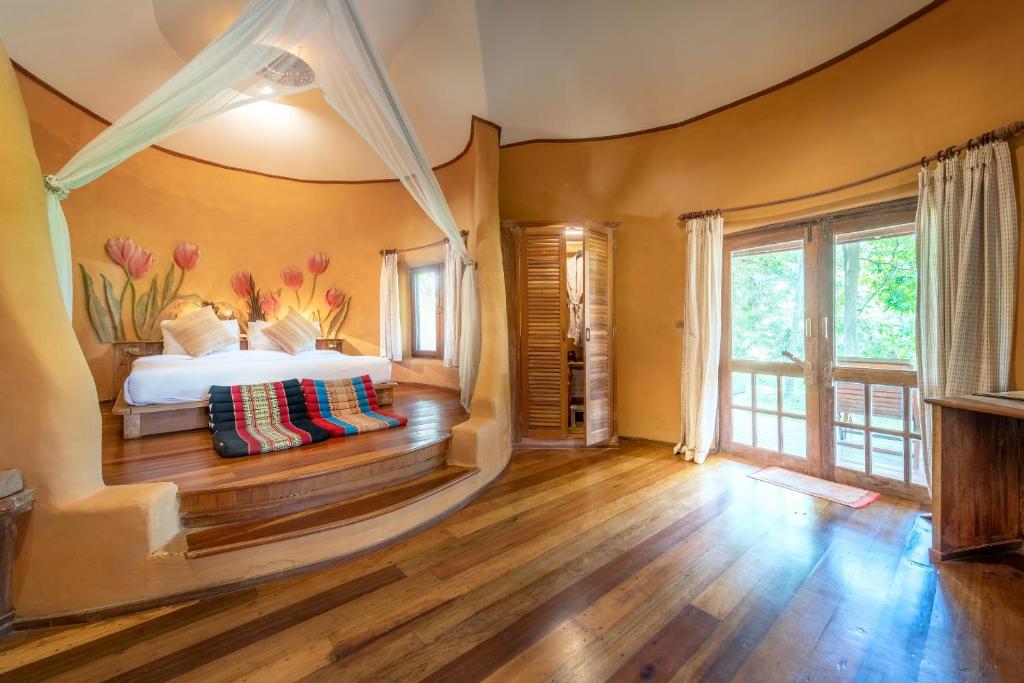 Postel nebo postele na pokoji v ubytování Vana Varin Resort