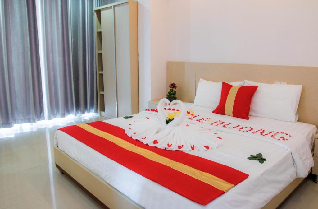 Postel nebo postele na pokoji v ubytování Le Duong Hotel