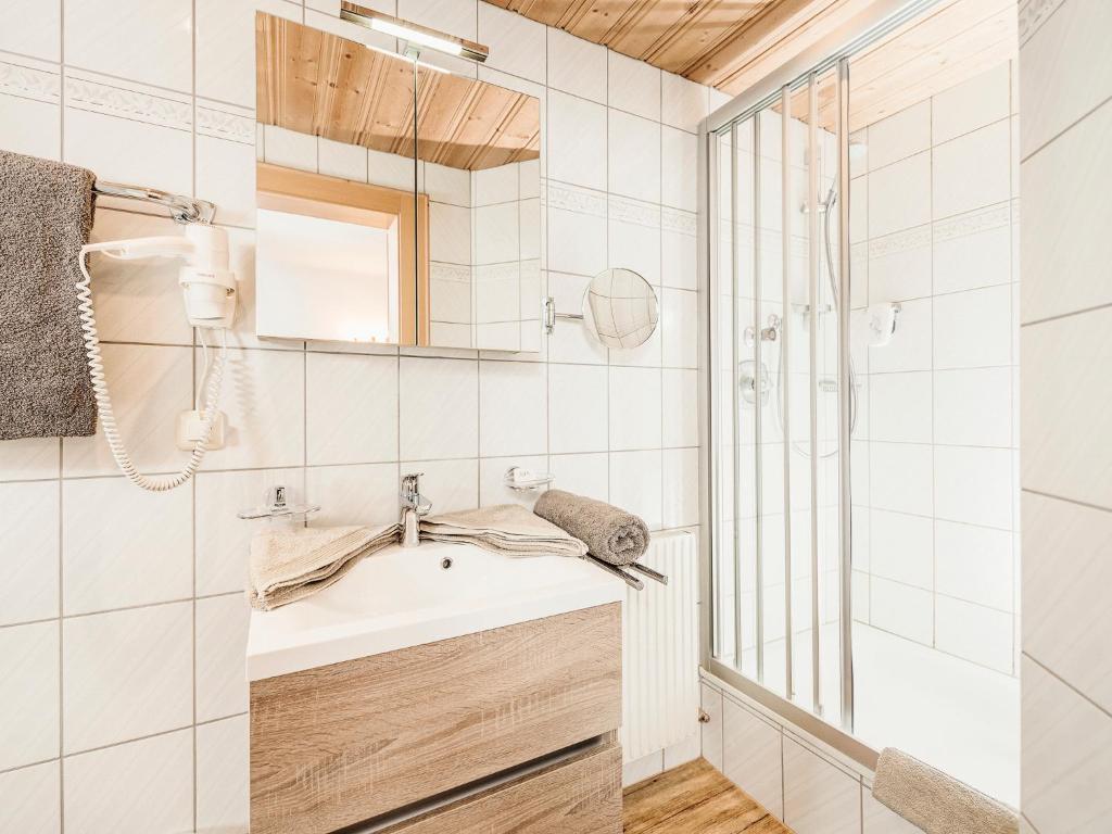 Posteľ alebo postele v izbe v ubytovaní Gästehaus Oblasser