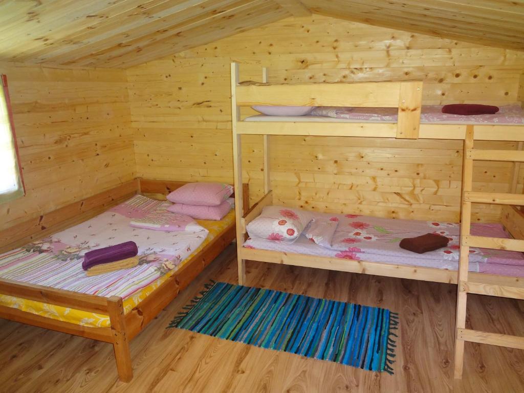 Postel nebo postele na pokoji v ubytování Järve Cottages