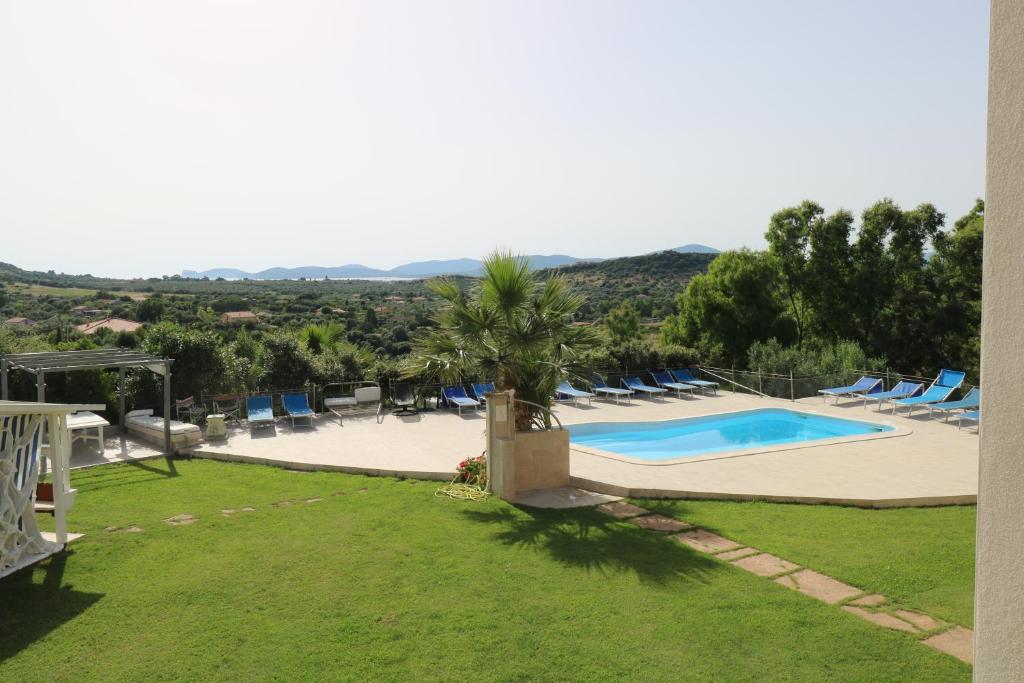 The swimming pool at or close to Carlo Apartments