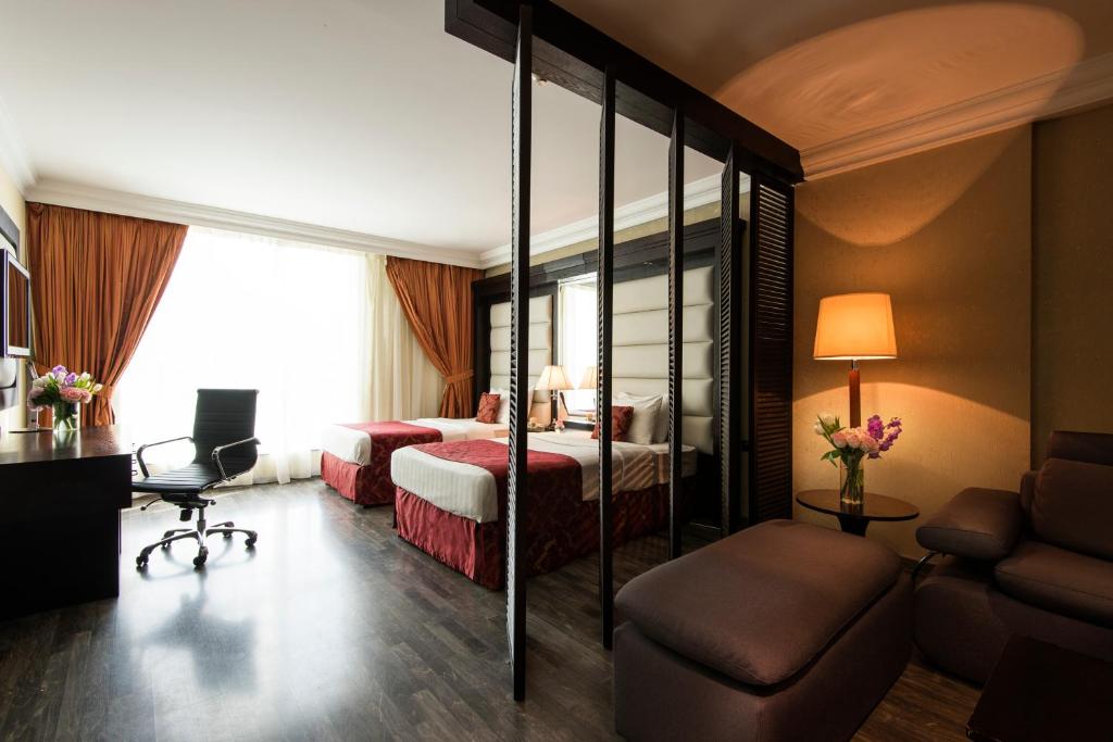Postel nebo postele na pokoji v ubytování Best Western Plus Doha