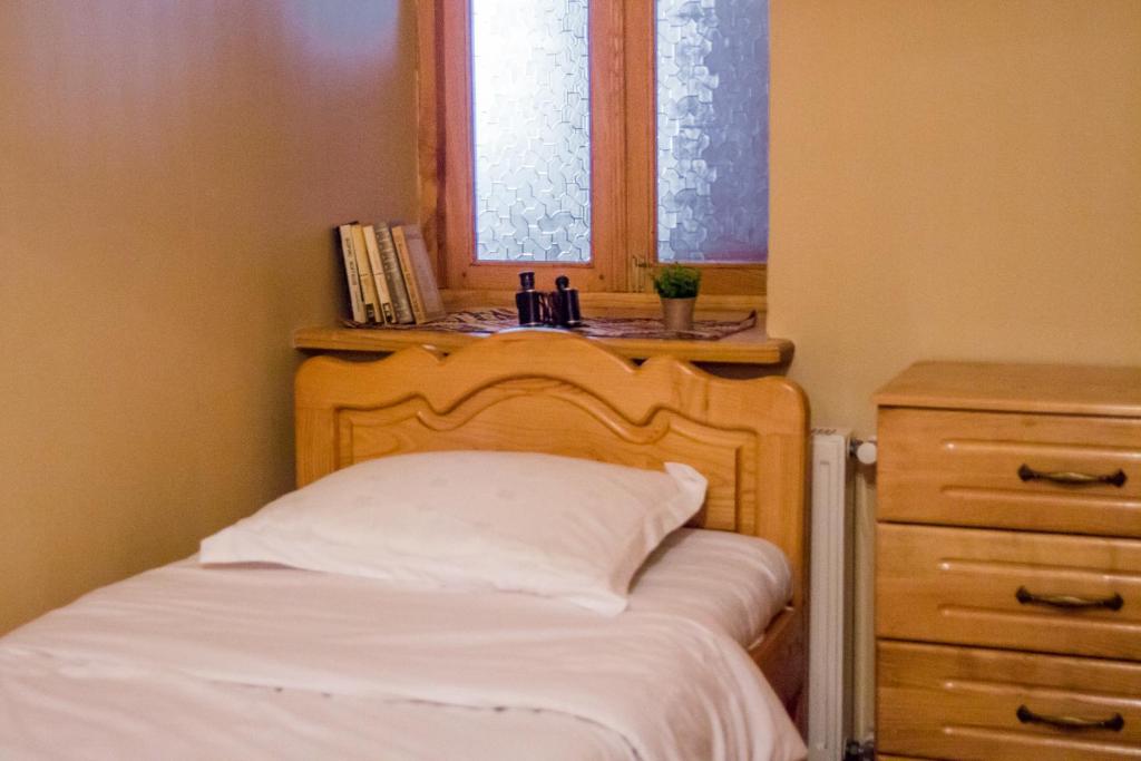 Postel nebo postele na pokoji v ubytování Hotel Magdalena