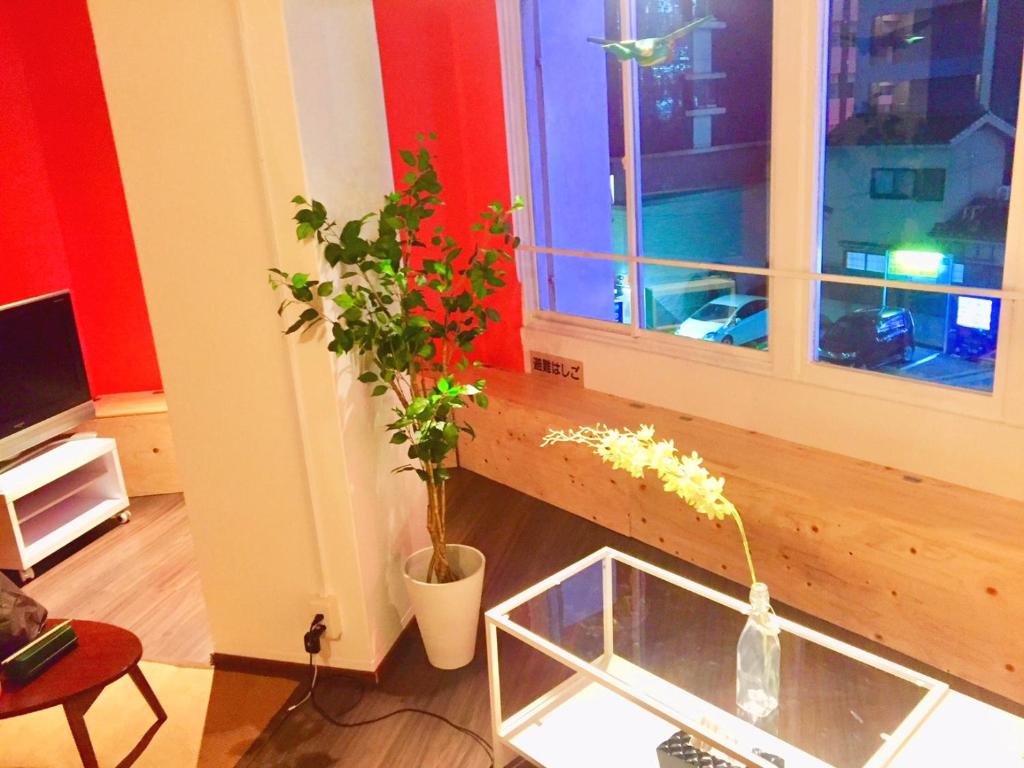 TV a/nebo společenská místnost v ubytování Cloud Sharing Hotel Hakata 1 Guesthouse Dormitory