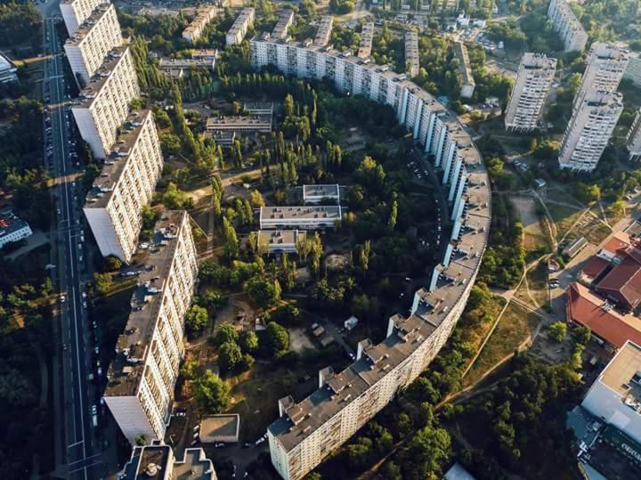 an aerial view of a city with tall buildings at Malishko in Kyiv
