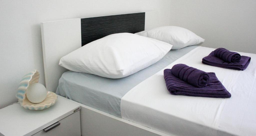 Postel nebo postele na pokoji v ubytování Apartment MEL II