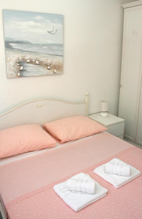 Postel nebo postele na pokoji v ubytování Apartment MEL II