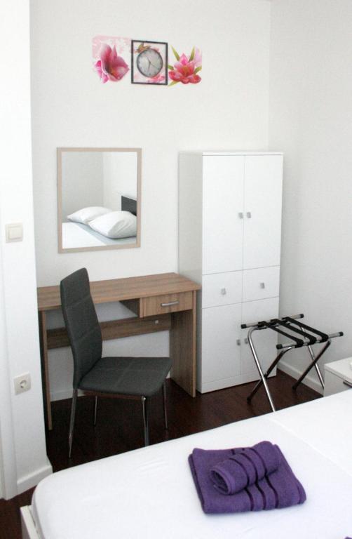 Postel nebo postele na pokoji v ubytování Apartment MEL II