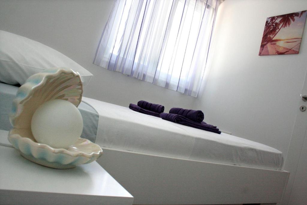 Postel nebo postele na pokoji v ubytování Apartment MEL II