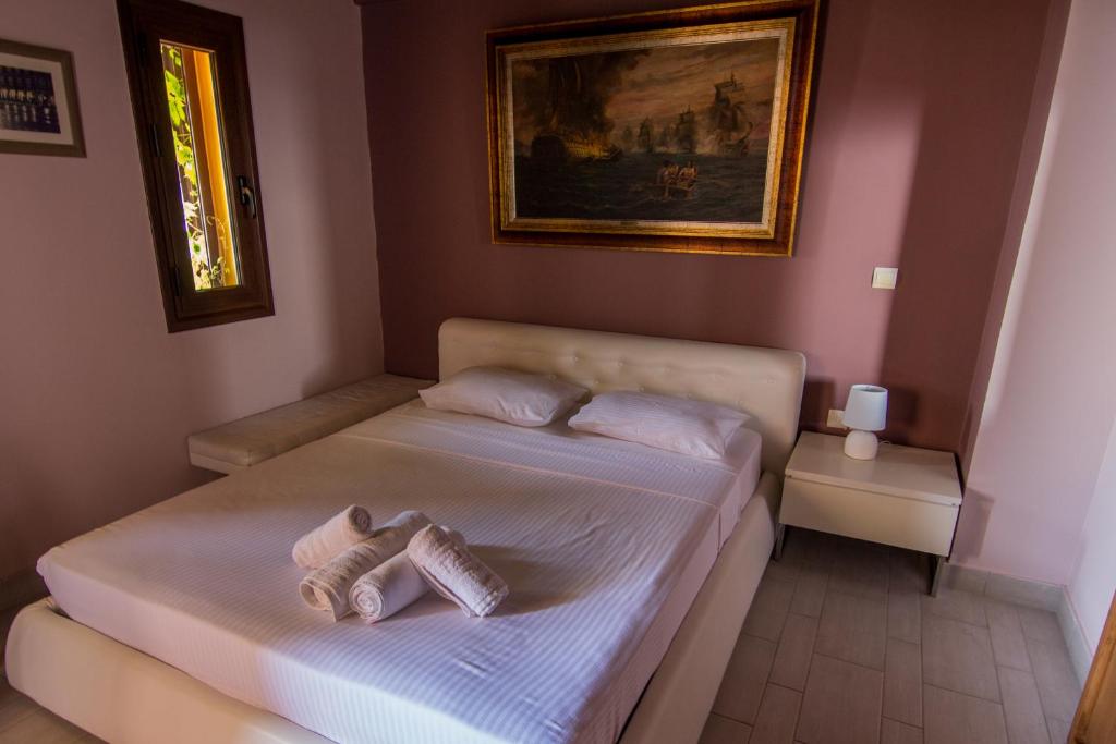 Postel nebo postele na pokoji v ubytování Tajo VIllas