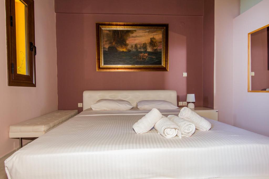 Postel nebo postele na pokoji v ubytování Tajo VIllas