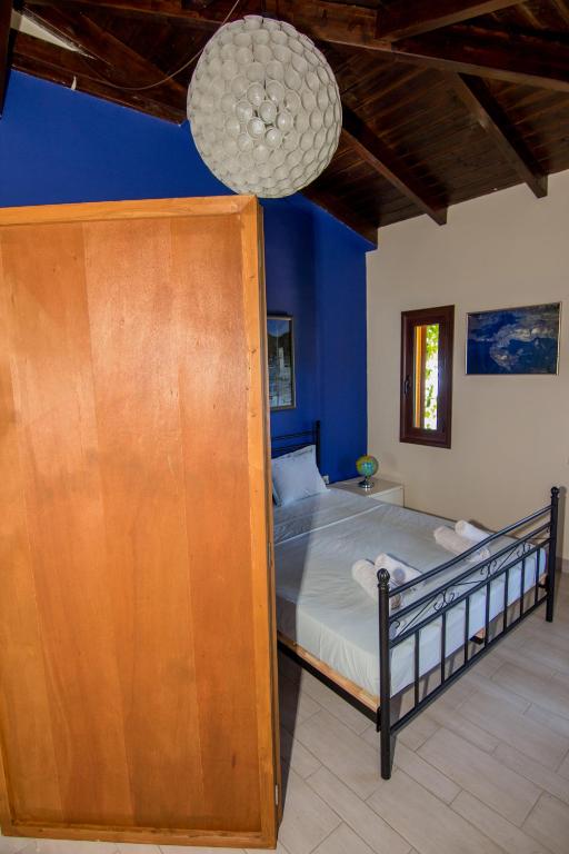Postel nebo postele na pokoji v ubytování Tajo VIllas