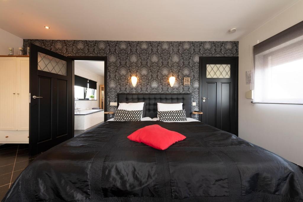 Postel nebo postele na pokoji v ubytování B&B Montenakerhof