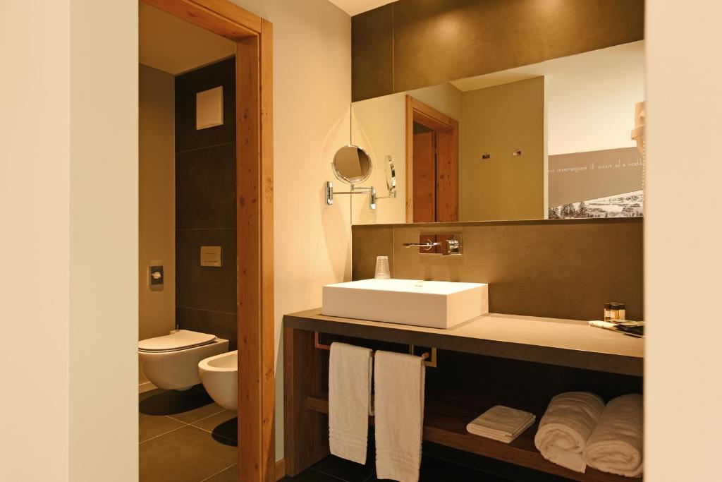 Kúpeľňa v ubytovaní Dolomeet Boutique Hotel