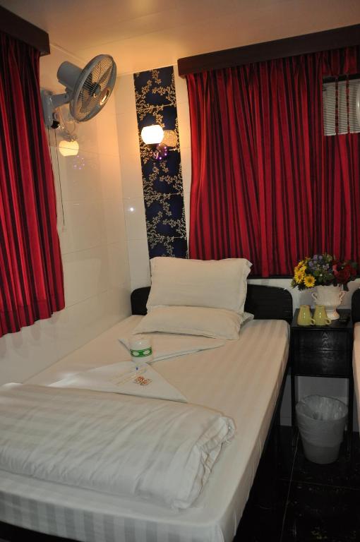 Katil atau katil-katil dalam bilik di Swiss Hostel