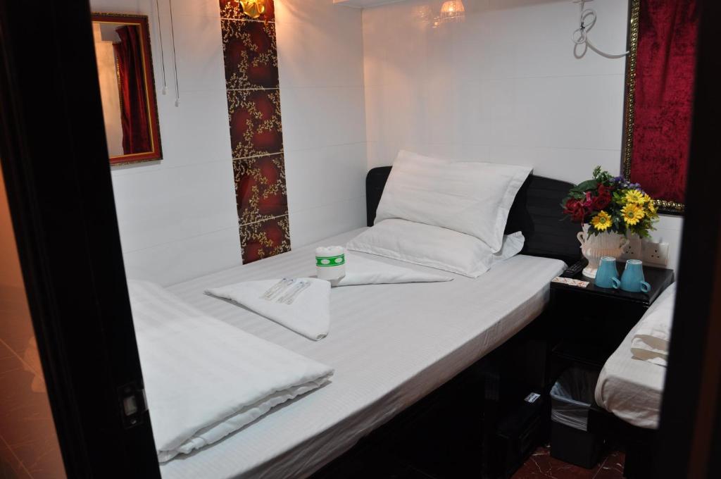 Postel nebo postele na pokoji v ubytování Swiss Hostel
