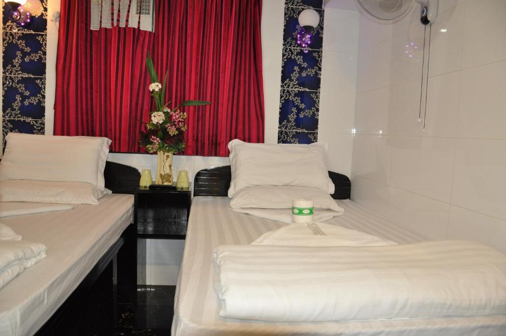 Postel nebo postele na pokoji v ubytování Swiss Hostel
