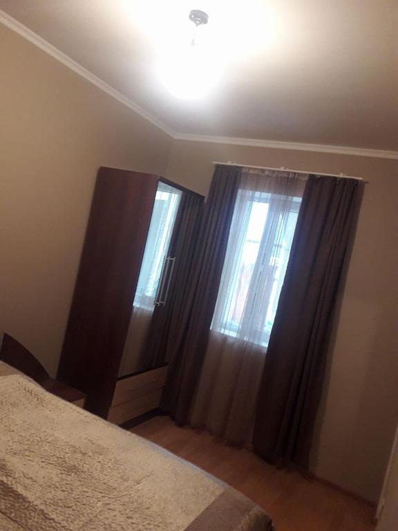 Postel nebo postele na pokoji v ubytování GergHouse